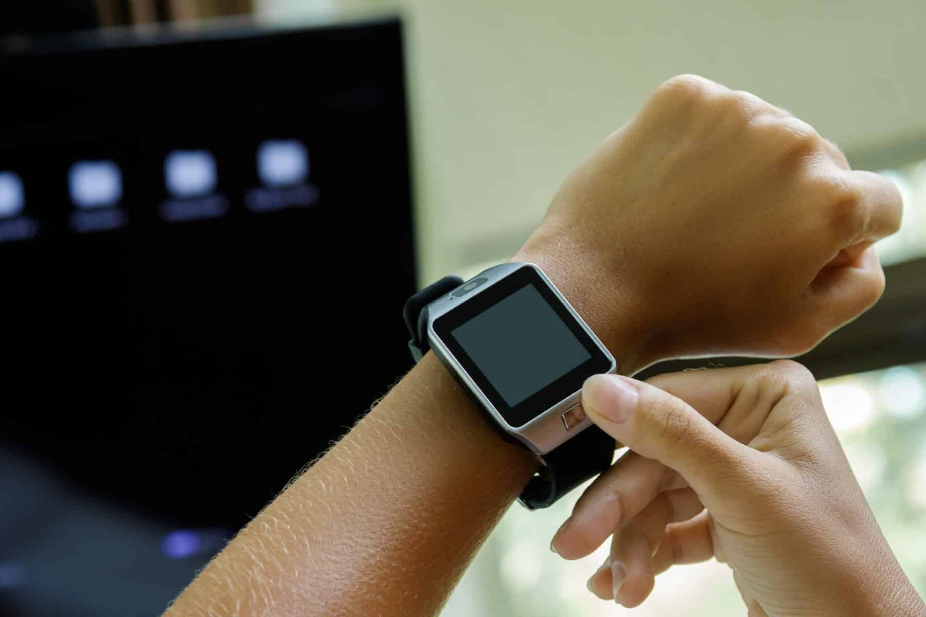 closeup of smart watch tv remote control